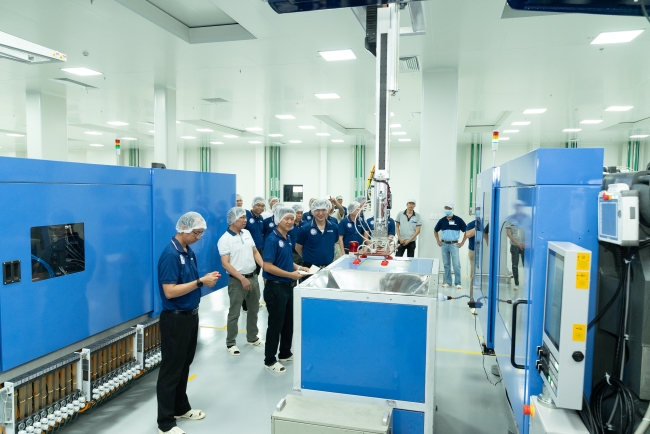 High-speed precision moulding equipment on Plascene's manufacturing floor at facility — part of ongoing $60M rPET investment programme