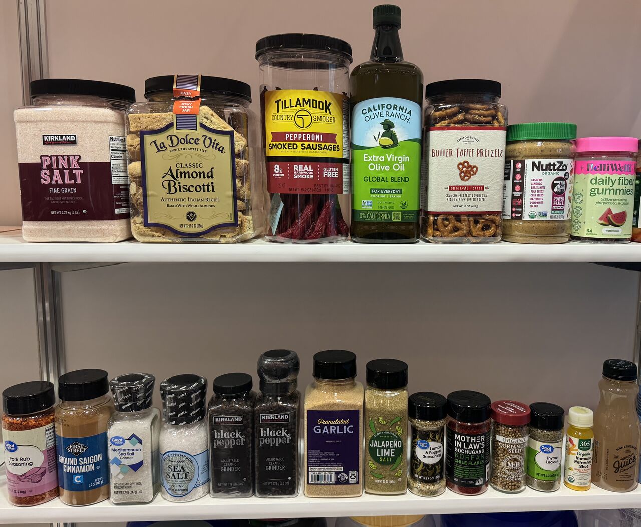 Plascene rPET packaging product samples displayed at the APS 2026 booth — bottles and containers for nutraceutical and functional beverage brands